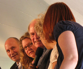 Jon Scieszka, Megan McDonald, Steven Kellogg, and Shannon Hale listening to Kate DiCamillo give her Exquisite Corpse teaser