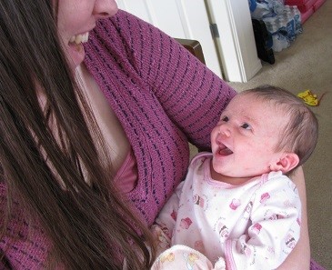 My newest niece Zoe smiling at her Aunt Laura.